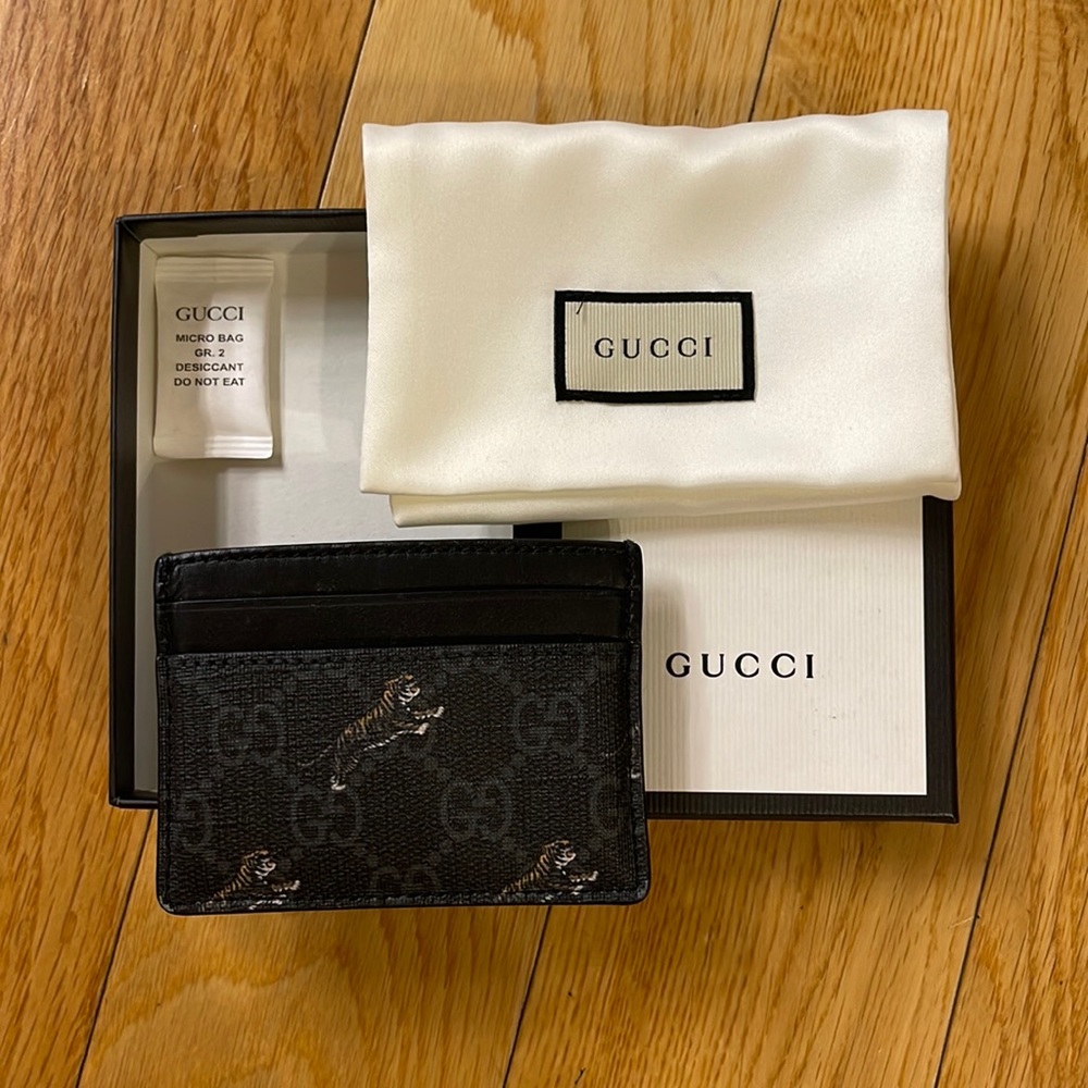 Gucci card case with tiger print